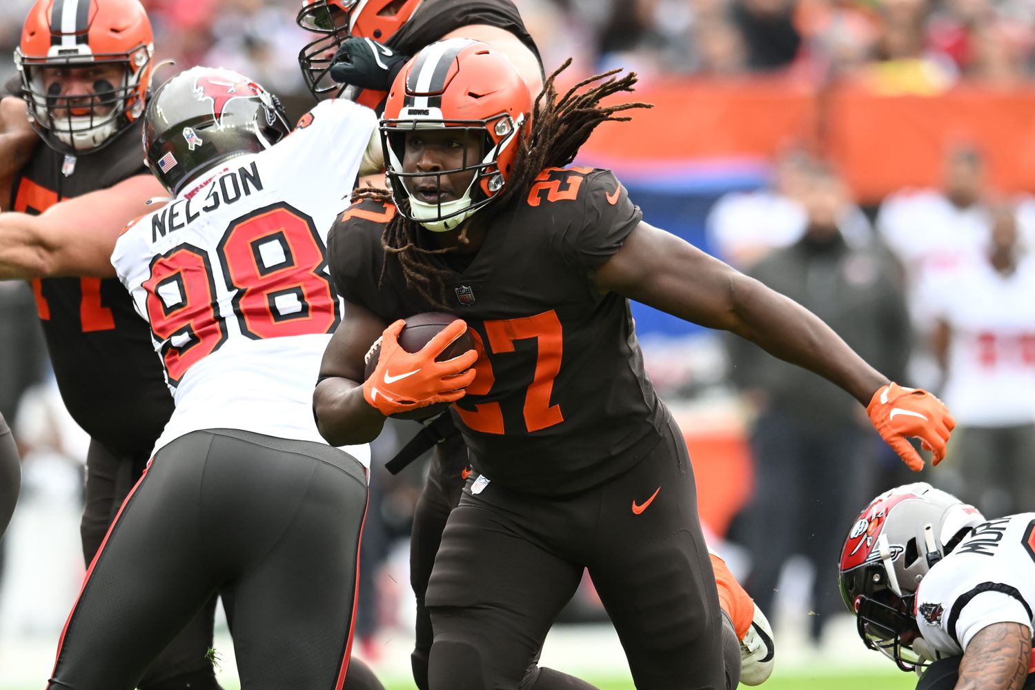 Nov 27, 2022; Cleveland, Ohio, USA; Cleveland Browns running back Kareem Hunt (27) runs with the ball during the first half against the Tampa Bay Buccaneers at FirstEnergy Stadium. Mandatory Credit: Ken Blaze-USA TODAY Sports
